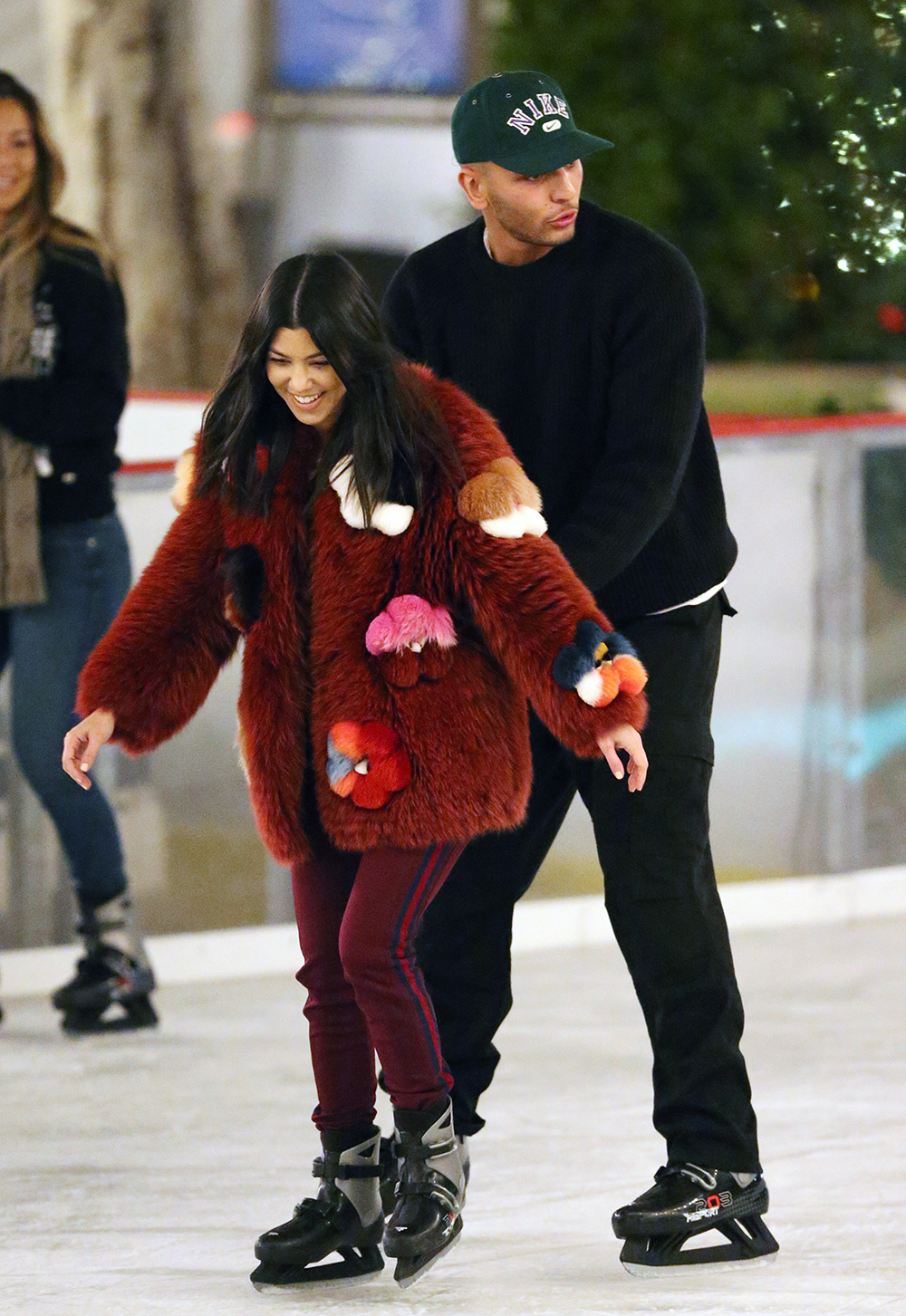 Kourtney Kardashian and boyfriend Younes Bendjima romantically ice skating together at a party in Thousand Oaks.Pictured: Kourtney Kardashian and Younes Bendjima Ref: SPL1640046  231217  Picture by: Brewer / Prahl / Splash NewsSplash News and PicturesLos Angeles:310-821-2666New York:212-619-2666London:870-934-2666photodesk@splashnews.com