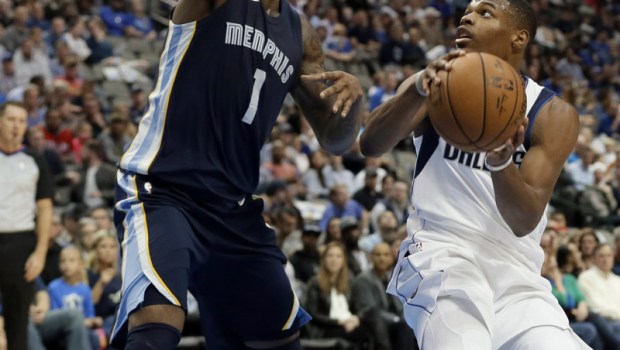 Dennis Smith Jr., Jarell Martin. Memphis Grizzlies' Jarell Martin, left, defends as Dallas Mavericks guard Dennis Smith Jr., right, attempts to take a shot during an NBA basketball game, in Dallas
Grizzlies Mavericks Basketball, Dallas, USA - 25 Oct 2017