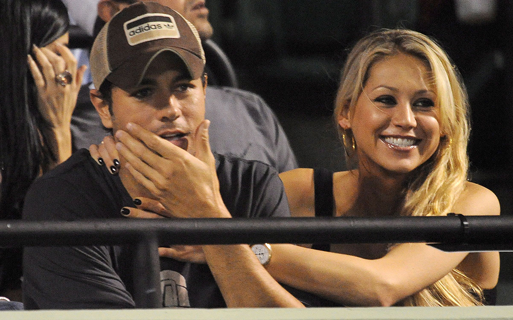 Singer Enrique Iglesias (l) and Anna Kournikova (r) Watch Serena Williams of the Usa Play Against Her Sister Venus Williams During Their Sony Ericsson Open Tennis Match On Key Biscayne Florida Usa 02 April 2009
Usa Tennis Sony Ericsson Open - Apr 2009