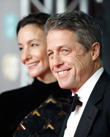 Anna Elisabet Eberstein and Hugh Grant
73rd British Academy Film Awards, Roaming Arrivals, Royal Albert Hall, London, UK - 02 Feb 2020