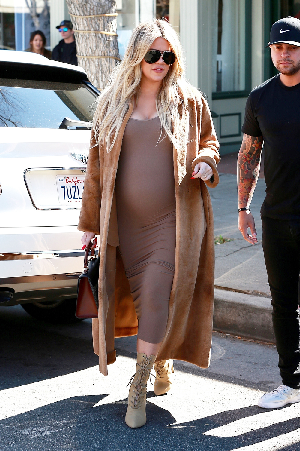 Sherman Oaks, CA  - Khloe Kardashian and Kris Jenner go shopping for the baby at Juvenile Shop in Sherman Oaks. The two are filming for "Keeping Up With The Kardashians." Khloe seems to take a leaf from Kim's book wearing a bodycon dress paired with a long fur coat.Pictured: Khloe KardashianBACKGRID USA 21 FEBRUARY 2018 BYLINE MUST READ: Javiles / BACKGRIDUSA: +1 310 798 9111 / usasales@backgrid.comUK: +44 208 344 2007 / uksales@backgrid.com*UK Clients - Pictures Containing ChildrenPlease Pixelate Face Prior To Publication*