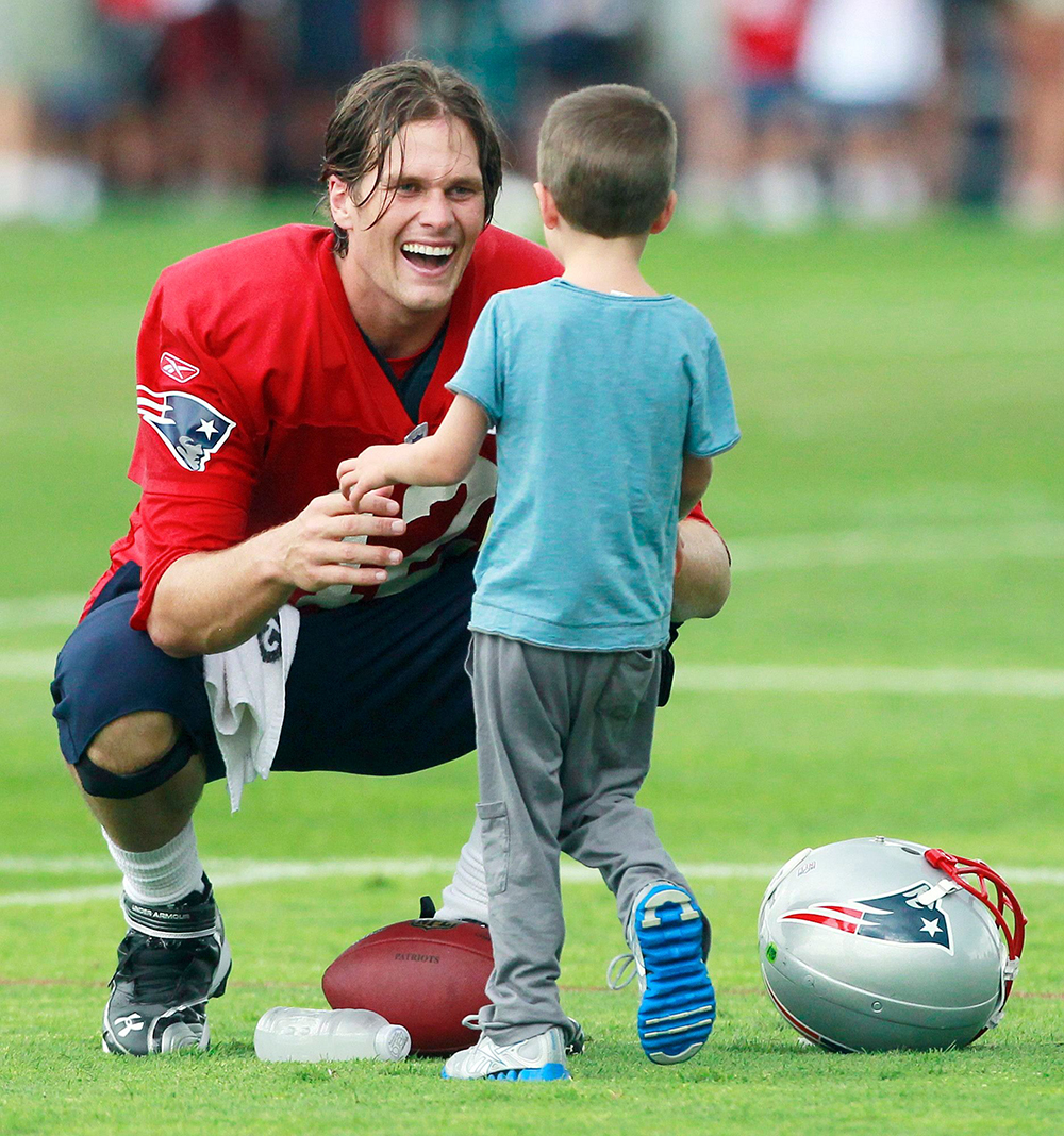 Tom Brady New England Patriots' Tom Brady greets his son Jack on the field after NFL football training camp, in Foxborough, Mass
Patriots Camp Football, Foxborough, USA