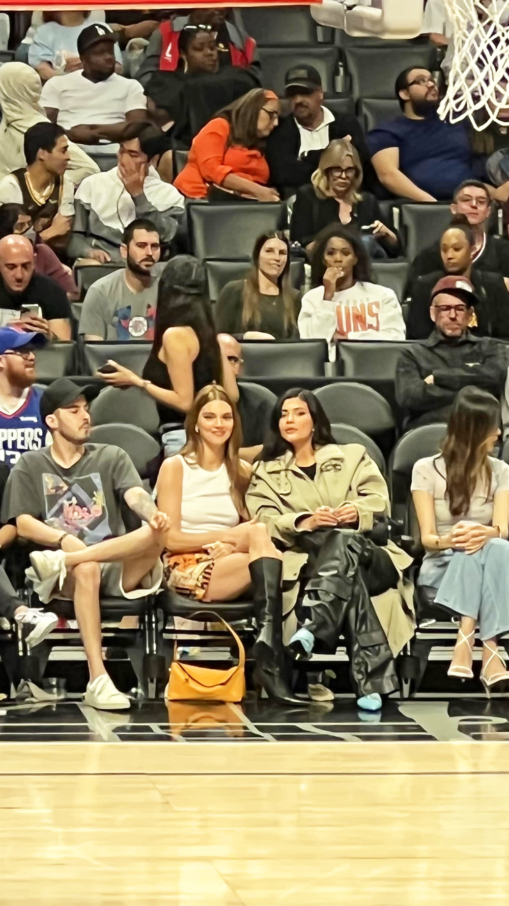 Los Angeles, CA  - Kendall and Kylie Jenner sit courtside at the Clippers game and appear to be closer than ever as they spent the whole time talking and checking out the action on the court.  Kylie appeared to be drinking a margarita as she watched alongside her sister who was there to support her boyfriend Devin Booker.

Pictured: Kendall Jenner, Kylie Jenner

BACKGRID USA 6 APRIL 2022 

BYLINE MUST READ: BACKGRID

USA: +1 310 798 9111 / usasales@backgrid.com

UK: +44 208 344 2007 / uksales@backgrid.com

*UK Clients - Pictures Containing Children
Please Pixelate Face Prior To Publication*