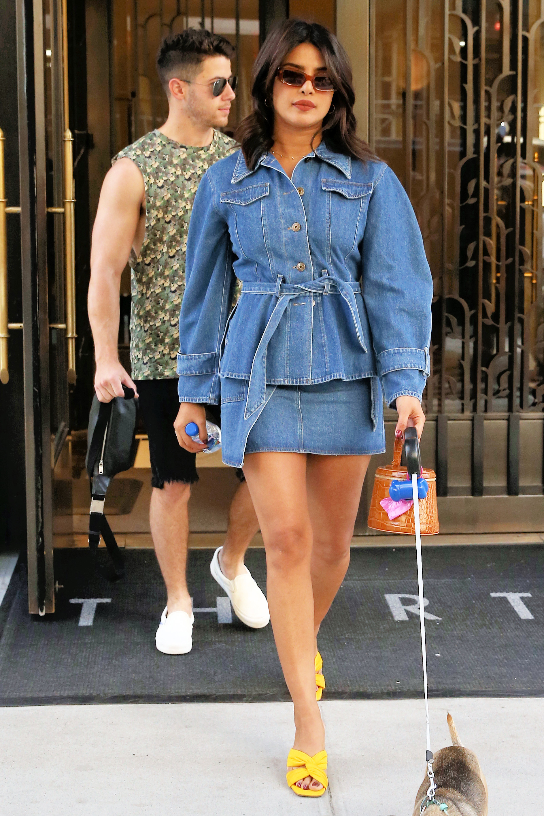 Singer Nick Jonas, wearing a camouflage vest and shorts, and Priyanka Chopra, wearing an all-denim outfit, leave their apartment with their dog Diana in New York City

Pictured: Nick Jonas,Priyanka Chopra
Ref: SPL5112148 310819 NON-EXCLUSIVE
Picture by: Christopher Peterson / SplashNews.com

Splash News and Pictures
Los Angeles: 310-821-2666
New York: 212-619-2666
London: 0207 644 7656
Milan: +39 02 56567623
photodesk@splashnews.com

World Rights