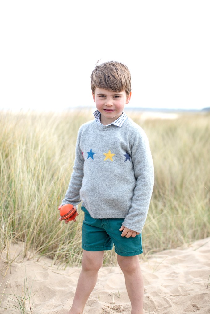 Prince Louis Plays On The Beach