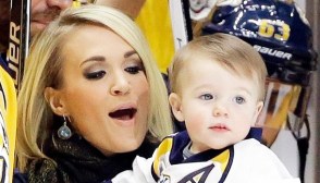 Mike Fisher, Carrie Underwood, Isaiah Fisher Nashville Predators forward Mike Fisher is honored for his 1,000th NHL hockey game before the first period of a game against the Los Angeles Kings, in Nashville, Tenn. With Fisher is his wife, singer Carrie Underwood, and their son, IsaiahKings Predators Hockey, Nashville, USA