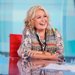 Roseanne Barr talks with Fox News talk show host Sean Hannity while being interviewed during a taping of his show, Thursday, July 26, 2018, in New York. The comedian and actress appeared on on the Fox News show "Hannity" on Thursday at 9 p.m. EDT for the first time since she was fired from ABC which canceled its successful reboot of "Roseanne" in May following the star's racist tweet likening former Obama adviser Valerie Jarrett to a cross between the Muslim Brotherhood and a "Planet of the Apes" actor. (AP Photo/Julie Jacobson)