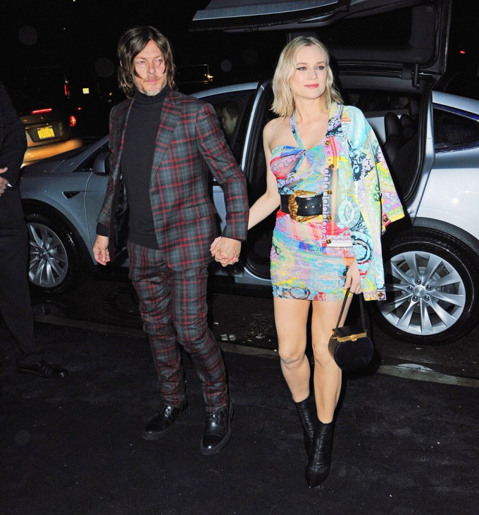 Diane Kruger & Norman Reedus Attend Versace Fashion Show