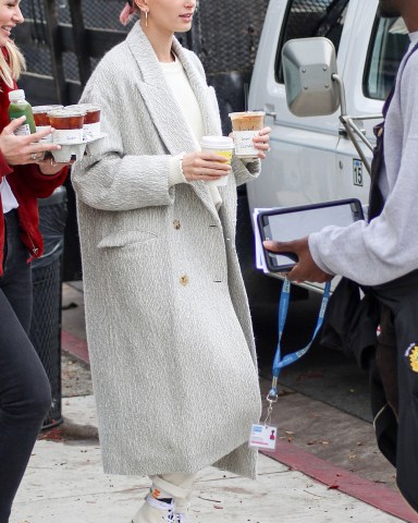 Hailey BaldwinHailey Baldwin out and about, Los Angeles, USA - 13 Jan 2019Wearing Isabel Marant, Coat, Wearing Brock Collection, Trousers, Shoes by Converse X the Fog