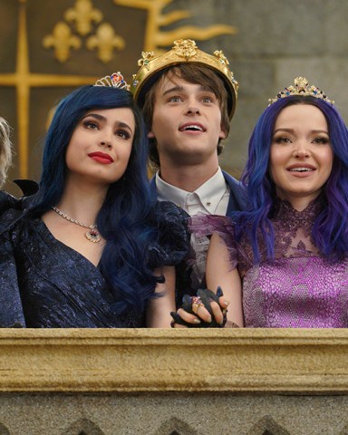 DESCENDANTS 3 - This highly anticipated third installment in the global hit Disney Channel Original Movie franchise continues the contemporary saga of good versus evil as the teenage daughters and sons of Disney's most infamous villains-Mal, Evie, Carlos and Jay (also known as the villain kids or VKs)-return to the Isle of the Lost to recruit a new batch of villainous offspring to join them at Auradon Prep. When a barrier breach jeopardizes the safety of Auradon during their departure off the Isle, Mal resolves to permanently close the barrier, fearing that nemeses Uma and Hades will wreak vengeance on the kingdom. Despite her decision, an unfathomable dark force threatens the people of Auradon and it's up to Mal and the VKs to save everyone in their most epic battle yet. "Descendants 3" is set to premiere on FRIDAY, AUG. 2 (8:00-10:00 p.m. EDT), on Disney Channel and DisneyNOW. (Disney Channel/David Bukach)
CAMERON BOYCE, SOFIA CARSON, MITCHELL HOPE, DOVE CAMERON, BOOBOO STEWART