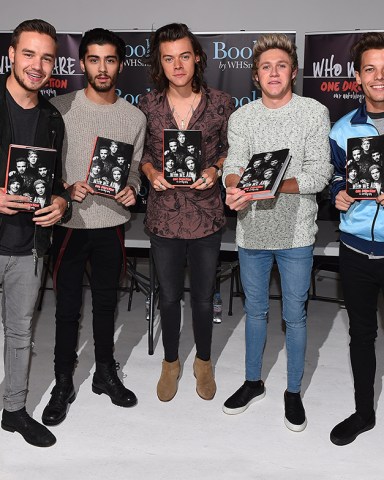 One Direction - Liam Payne, Zayn Malik, Harry Styles, Niall Horan and Louis Tomlinson holding copies of their autobiography 'One Direction: Who We Are''One Direction: Who We Are' autobiography book signing, London, Britain - 29 Oct 2014The World's biggest boy band One Direction took part in a top secret event on Wednesday to meet fans and sign copies of their new autobiography 'One Direction: Who We Are'.Tickets for the event sold out in less than a minute and those lucky enough to get one were asked to meet at a specific location before being driven by coaches to the top secret venue.Zayn, Niall, Harry, Liam and Louis recently revealed that the next 1D single will be called 'Night Changes' and is taken from their forthcoming album 'Four'.