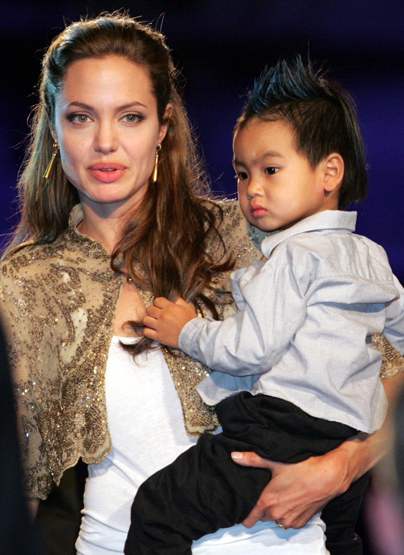 From Sept. 10, 2004. A paparazzo was arrested after he was discovered hiding in bushes outside a daycare center attended by Jolie's adopted son, authorities said. Photographer Clint Brewer, 25, was trying to take pictures of 4-year-old Maddox Jolie-Pitt, according to Cindy Guagenti, a publicist for Jolie's partner, Brad Pitt
PEOPLE MADDOX JOLIE-PITT, VENICE, Italy