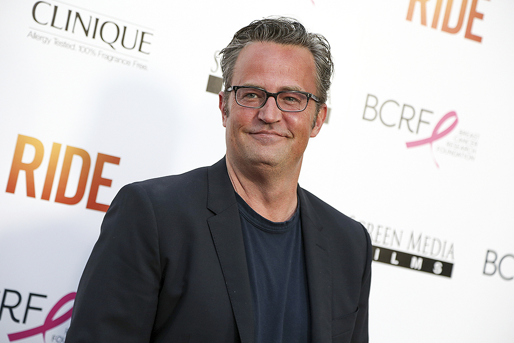 FILE - In this April 28, 2015, file photo, Matthew Perry arrives at the LA Premiere of "Ride" in Los Angeles. The former "Friends" star appears with Katie Holmes, who reprises her role as Jackie Kennedy in "The Kennedys After Camelot,” which premieres on the Reelz channel on April 2. (Photo by Rich Fury/Invision/AP, File)