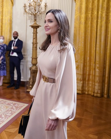 Actress and activist Angelina Jolie arrives to attend an event to celebrate the reauthorization of the Violence Against Women Act in the East Room of the White House, in Washington
Biden, Washington, United States - 16 Mar 2022