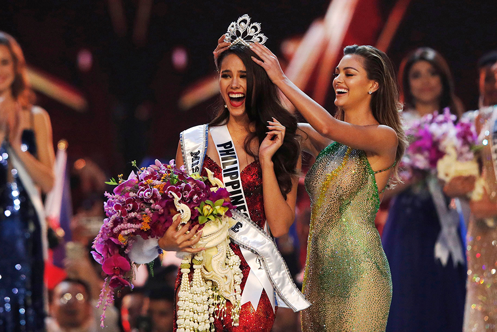 Editorial use onlyMandatory Credit: Photo by RUNGROJ YONGRIT/EPA-EFE/REX/Shutterstock (10035409s)The new Miss Universe 2018 Catriona Gray (L) of the Philippines jubilates as she is crowned by Miss Universe 2017 Demi-Leigh Nel-Peters (R) of South Africa during the Miss Universe 2018 beauty pageant at Impact Arena in Bangkok, Thailand, 17 December 2018. Women representing 94 nations will participate in the 67th Miss Universe 2018 beauty pageant in Bangkok.Miss Universe 2018 beauty pageant in Bangkok, Thailand - 17 Dec 2018