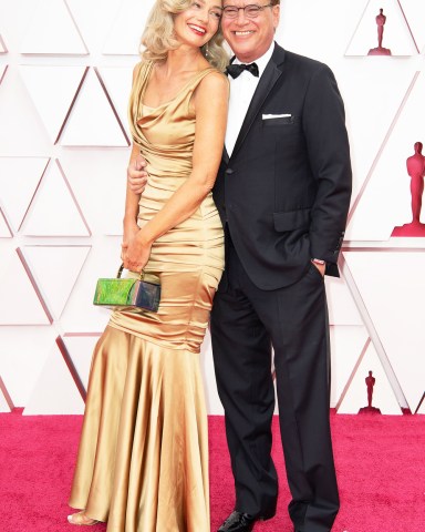 FOR EDITORIAL USE ONLY. No marketing or advertising is permitted without the prior consent of A.M.P.A.S.
Mandatory Credit: Photo by Matt Petit/A.M.P.A.S./Shutterstock (11875500tj)
Aaron Sorkin (L) and Paulina Porizkova arrive on the red carpet of The 93rd Oscars® at Union Station in Los Angeles, CA on Sunday, April 25, 2021.
93rd Annual Academy Awards, Arrivals, Los Angeles, USA - 25 Apr 2021