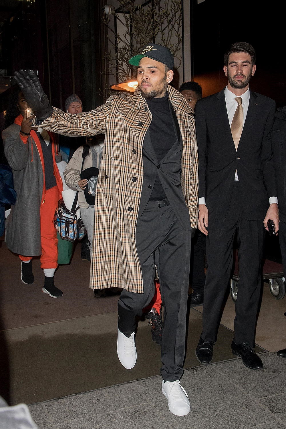 ** RIGHTS: ONLY UNITED STATES, AUSTRALIA, CANADA, NEW ZEALAND ** Paris, FRANCE  - Singer Chris Brown is in good spirits after being released Tuesday from police custody after a woman filed a rape complaint against them. Pictured here exiting Mandarin Oriental Paris and sharing good vibes with his many fans.

Pictured: Chris Brown

BACKGRID USA 23 JANUARY 2019 

BYLINE MUST READ: Best Image / BACKGRID

USA: +1 310 798 9111 / usasales@backgrid.com

UK: +44 208 344 2007 / uksales@backgrid.com

*UK Clients - Pictures Containing Children
Please Pixelate Face Prior To Publication*