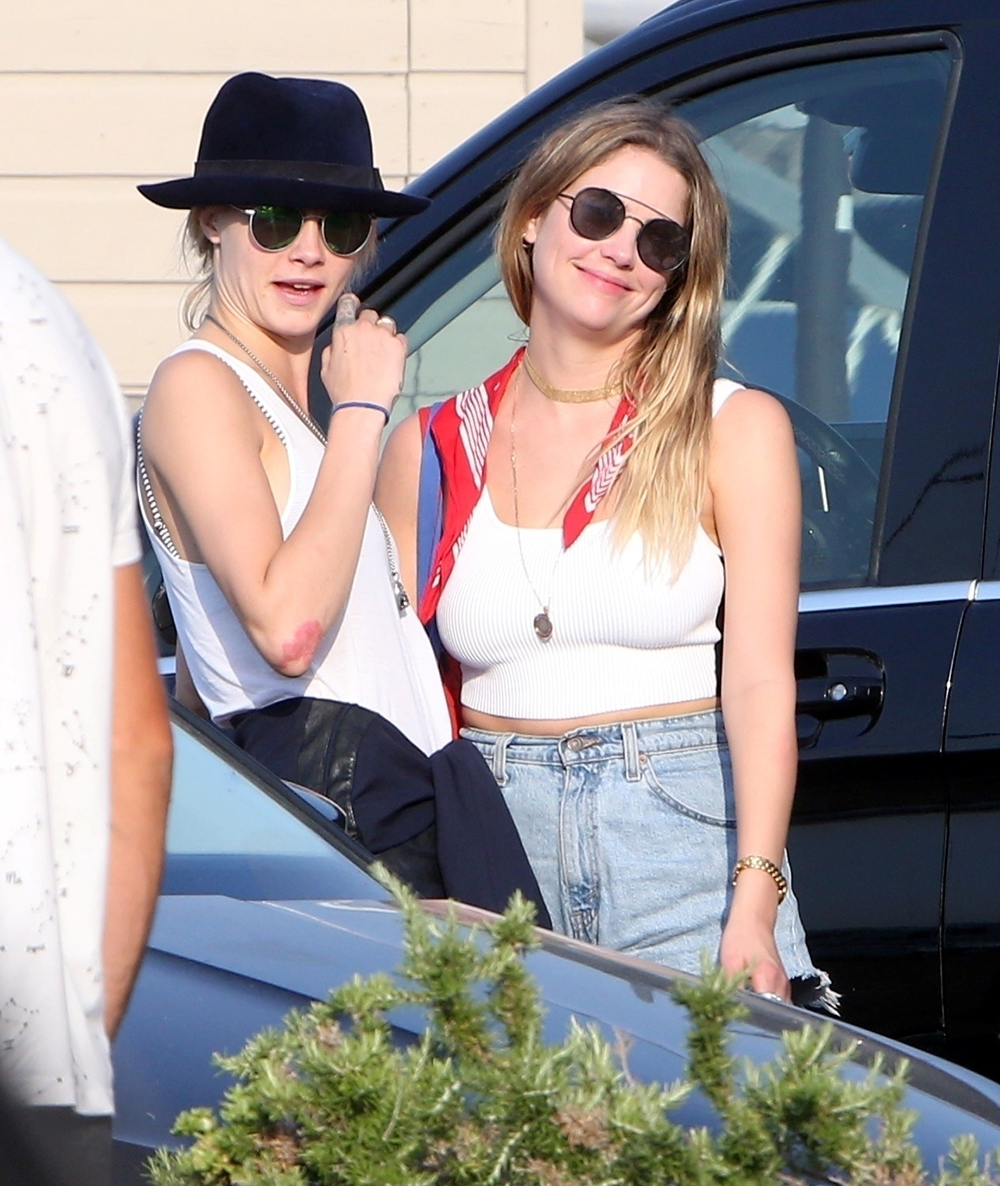 *EXCLUSIVE* Cara Delevigne and Ashley Benson pack on the PDA during their Summer vacation together