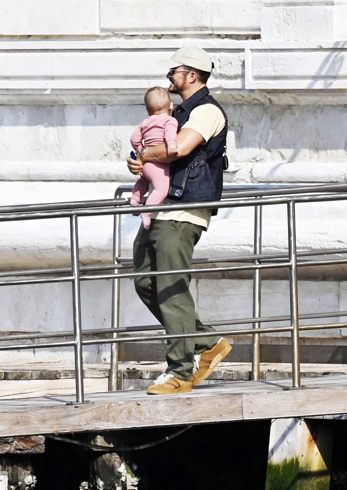 Orlando Bloom Cradles Baby Daisy