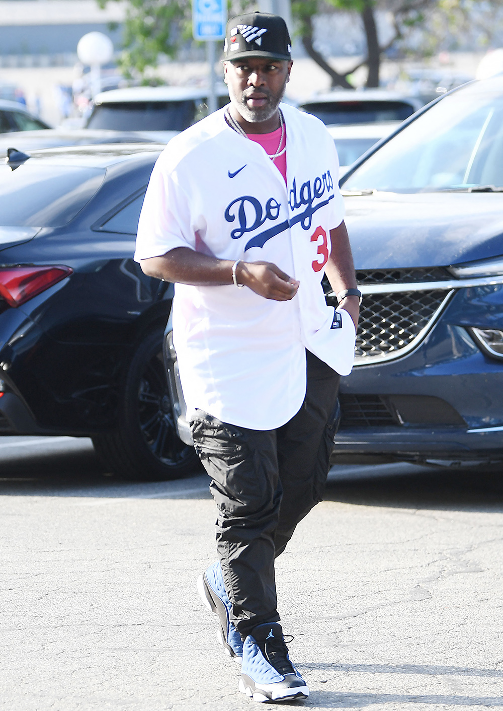 EXCLUSIVE: Corey Gamble wears a Dodgers jersey heading  into the L.A. Dodgers playoff game sans Kris Jenner