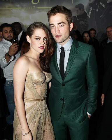 Kristen Stewart, left, and Robert Pattinson attend the world premiere of "The Twilight Saga: Breaking Dawn Part II" at the Nokia Theatre, in Los Angeles
World Premiere of The Twilight Saga Breaking Dawn Part II, Los Angeles, USA - 12 Nov 2012