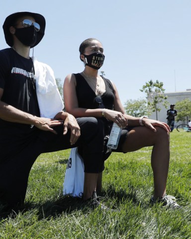 Golden State Warriors player Stephen Curry (L) and his wife Ayesha (R) during a demonstration over the arrest in Minnesota of George Floyd, who later died in police custody, in Oakland, California, USA, 03 June 2020. A bystander's video posted online on 25 May, appeared to show George Floyd, 46, pleading with arresting officers that he couldn't breathe as an officer knelt on his neck. The unarmed black man later died in police custody.
California protest in wake of George Floyd death in Minneapolis, Oakland, USA - 03 Jun 2020