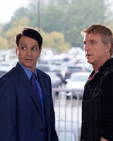 COBRA KAI (L to R) RALPH MACCHIO as DANIEL LARUSSO and WILLIAM ZABKA as JOHNNY LAWRENCE  of COBRA KAI Cr. CURTIS BONDS BAKER/NETFLIX © 2020