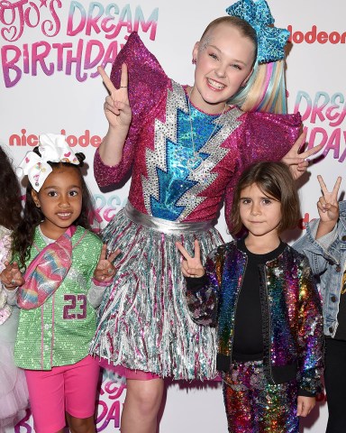 JoJo Siwa Celebrates Her Sweet 16 Birthday. 09 Apr 2019 Pictured: North West,JoJo Siwa,Penelope Disick. Photo credit: AXELLE/BAUER-GRIFFIN / MEGA TheMegaAgency.com +1 888 505 6342 (Mega Agency TagID: MEGA397354_001.jpg) [Photo via Mega Agency]