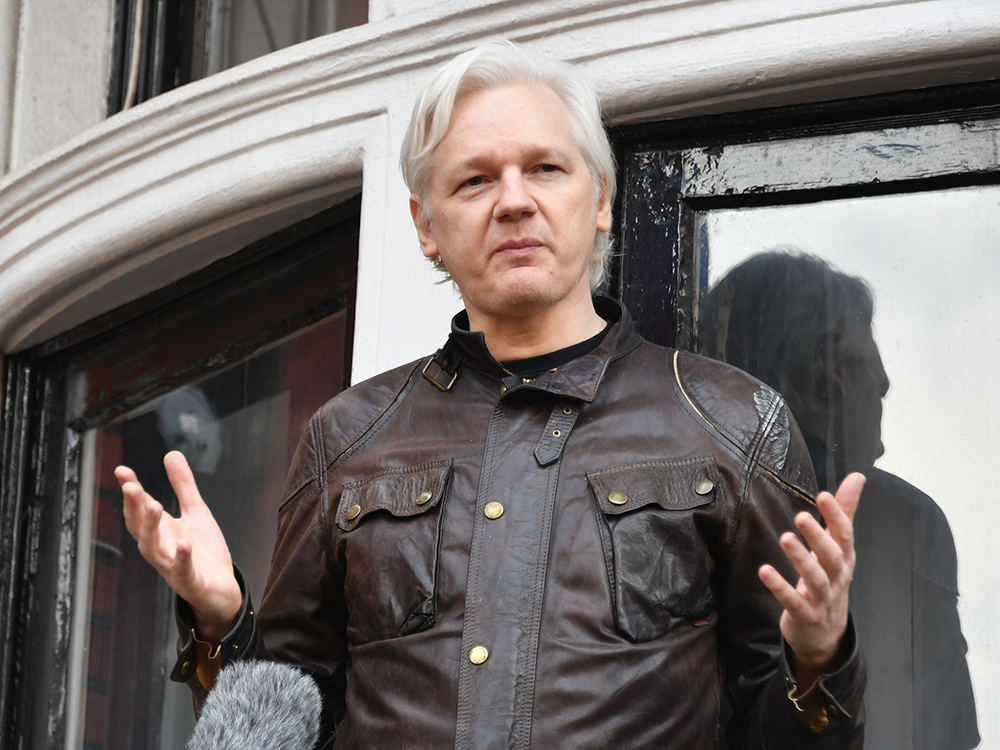 Julian Assange . Wikileaks Fugitive Julian Assange Pictured On The Balcony Of The Equadorian Embassy In Central London Where He Has Been Living For Nearly Five Years After Swedish Prosecutors Said They Would Not Pursue Rape Charges Against Him. See S