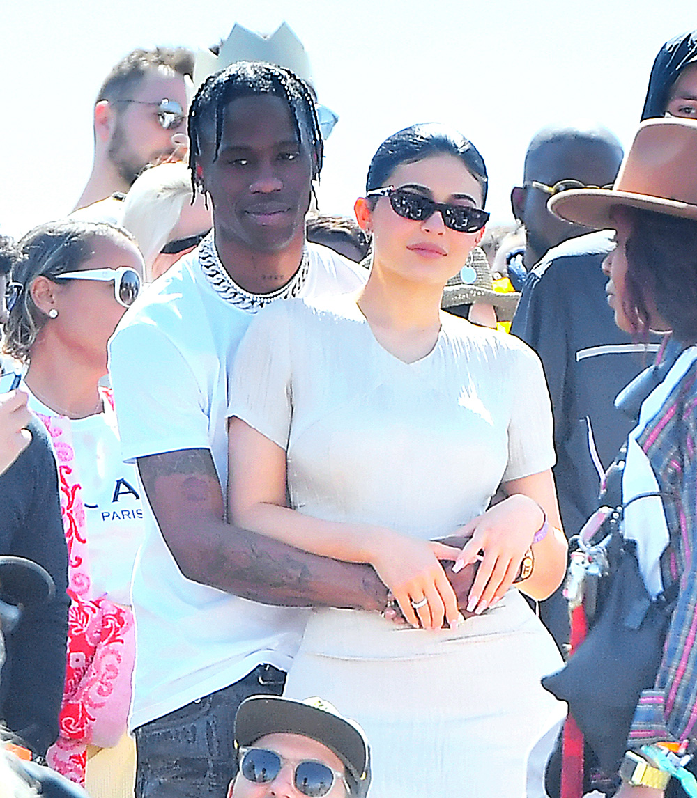 Travis Scott and Kylie Jenner show lots of PDA while watching Kanye West perform his 'Church Sunday Services' at Coachella in Indio, CA.