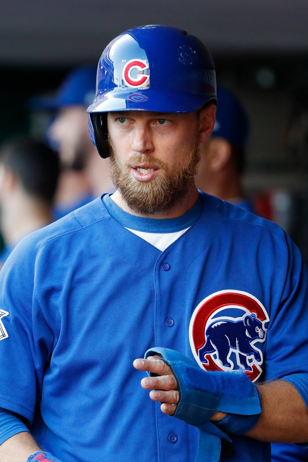 Chicago Cubs' Ben Zobrist walks through the dugout after scoring on an RBI single by Jason Heyward off Cincinnati Reds starting pitcher Asher Wojciechowski in the first inning of a baseball game, in CincinnatiCubs Reds Baseball, Cincinnati, USA - 23 Aug 2017