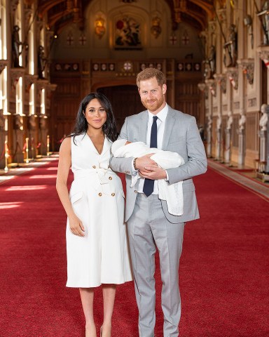 Prince Harry and Meghan Duchess of Sussex with their baby son during a photocall in St George's Hall at Windsor Castle in BerkshirePrince Harry and Meghan Duchess of Sussex new Baby Photocall, Windsor Castle, UK - 08 May 2019