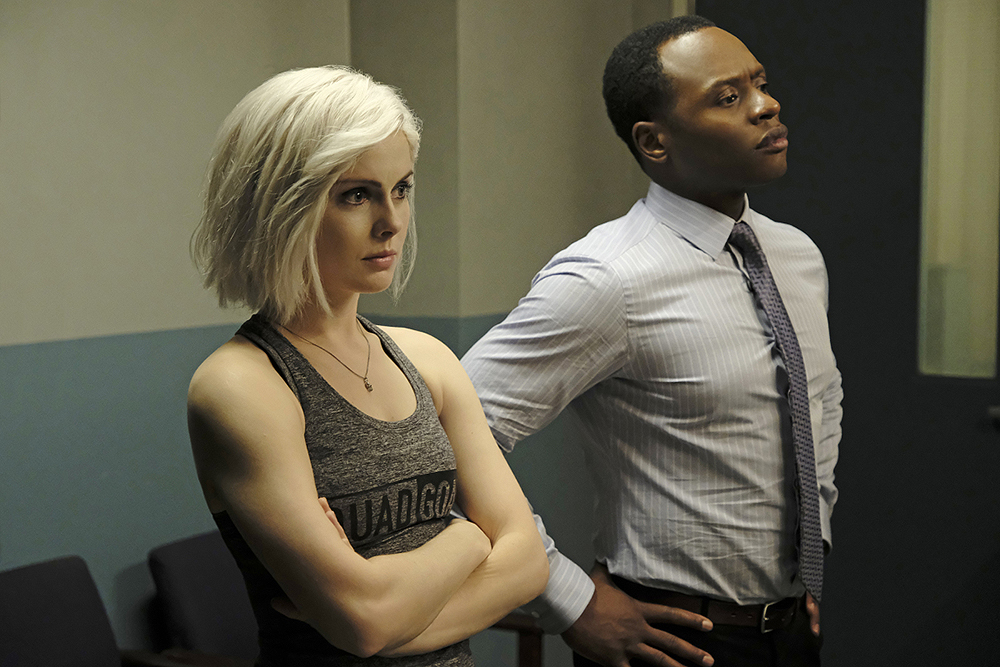 iZombie -- "Dead Lift" -- Image Number: ZMB502a_0397b.jpg -- Pictured (L-R): Rose McIver as Liv and Malcolm Goodwin as Clive -- Photo Credit: Michael Courtney/The CW -- ÃÂ© 2019 The CW Network, LLC. All Rights Reserved.