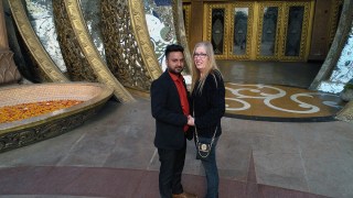 Jenny and Sumits hero shot in a temple in India.