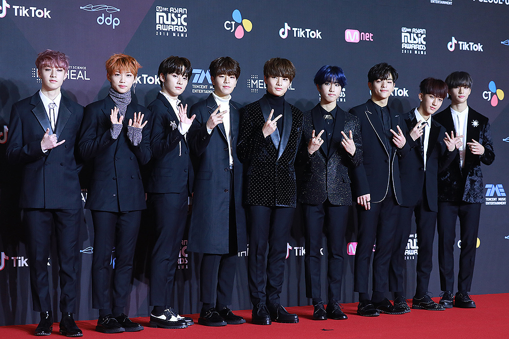 Members of South Korean boy band Stray Kids pose they arrive at the red carpet for the 2018 Mnet Asian Music Awards (MAMA) Premiere in Seoul, South Korea, 10 December 2018.  (Imaginechina via AP Images)