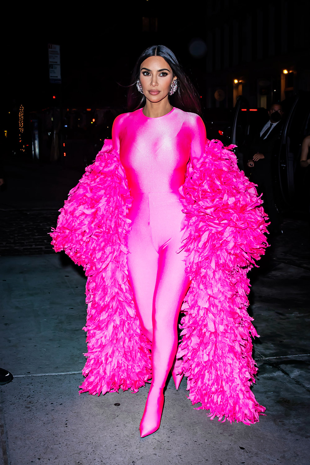 Kim Kardashian Stuns In A Hot Pink Feathered Catsuit As She Celebrates Her First Hosting Gig On SNL At Zero Bond