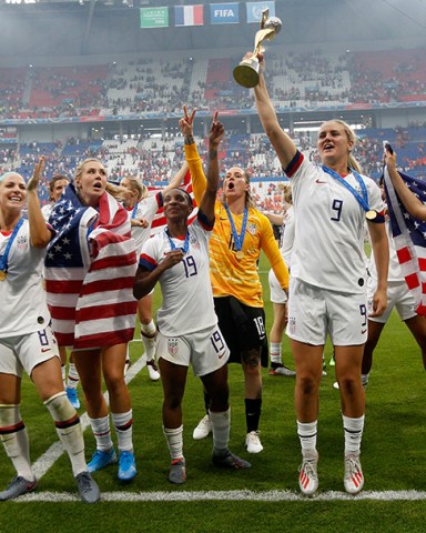 United States' players jump to celebrate with the trophy after winning the Women's World Cup final soccer match between US and The Netherlands at the Stade de Lyon in Decines, outside Lyon, France
US Netherlands WWCup Soccer, Decines, France - 07 Jul 2019