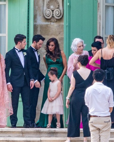 ** RIGHTS: ONLY UNITED STATES, AUSTRALIA, CANADA, NEW ZEALAND ** Sarrians, FRANCE  - Members of Joe Jonas' family take photos at Château de Tourreau in Sarrians before leaving for Joe Jonas' and Sophie Turner's wedding at the Chateau de Martinet in Carpentras, France, June 29, 2019.Pictured: Priyanka Chopra, Nick Jonas, Kevin Jonas, Danielle Jonas, Alena Jonas, Frances Madonia-Miller, DenisBACKGRID USA 29 JUNE 2019 BYLINE MUST READ: Best Image / BACKGRIDUSA: +1 310 798 9111 / usasales@backgrid.comUK: +44 208 344 2007 / uksales@backgrid.com*UK Clients - Pictures Containing ChildrenPlease Pixelate Face Prior To Publication*