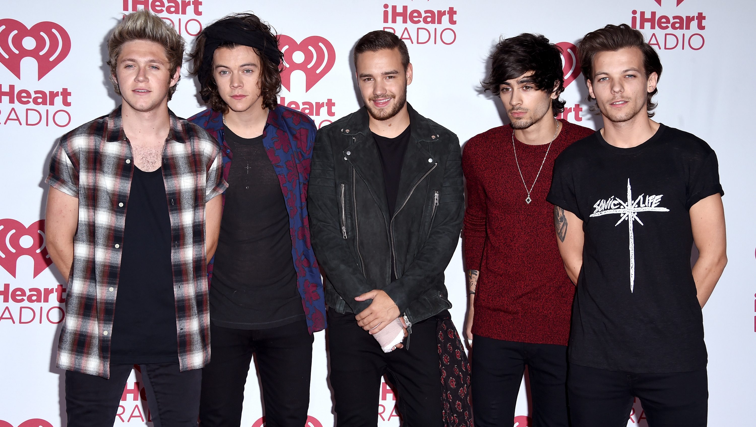 LAS VEGAS, NV - SEPTEMBER 20:  (L-R) Niall Horan, Harry Styles, Liam Payne, Zayn Malik and Louis Tomlinson of One Direction pose in the press room during the 2014 iHeartRadio Music Festival at MGM Grand Garden Arena on September 20, 2014 in Las Vegas, Nevada.  (Photo by Steve Granitz/WireImage)