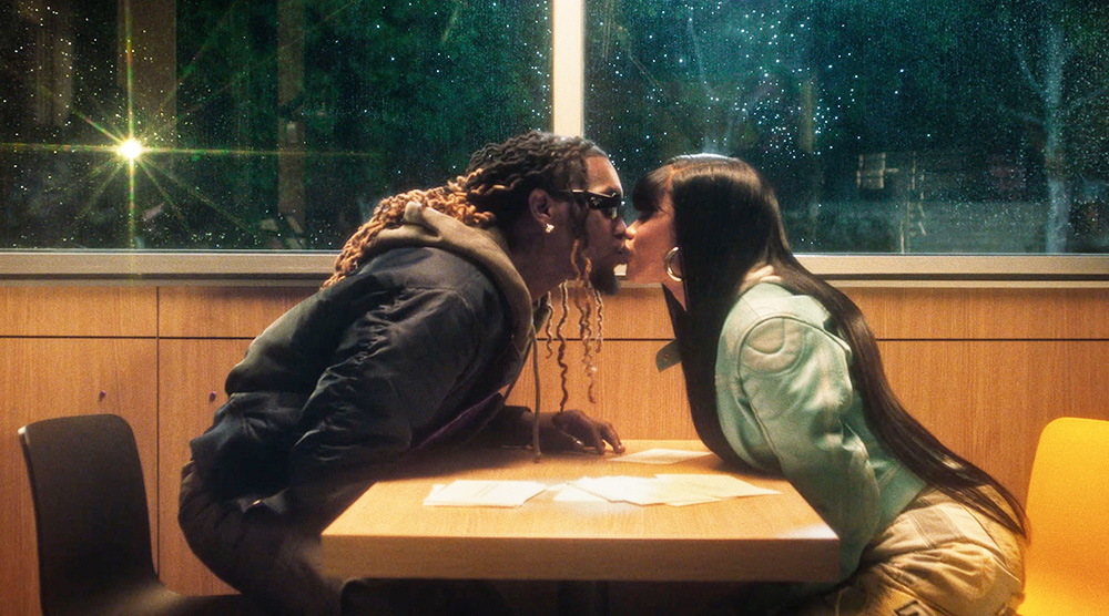 Cardi B and Offset get romantic with a kiss as they launch their date-night McDonald’s meal on Valentine’s Day