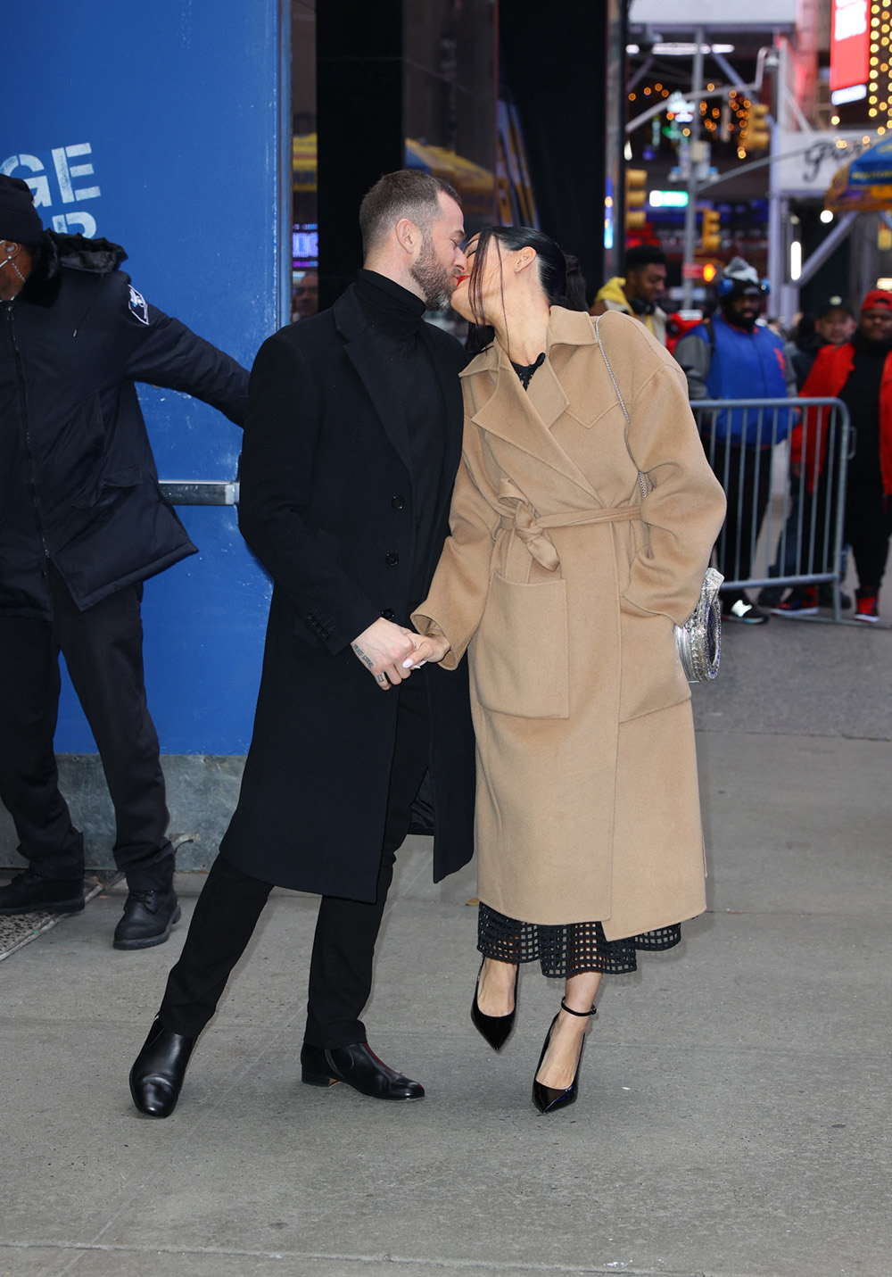 WWE wrestler Nikki Bella seen kissing her husband Artem Chigvintsev after making an appearance on Good Morning America in New York City