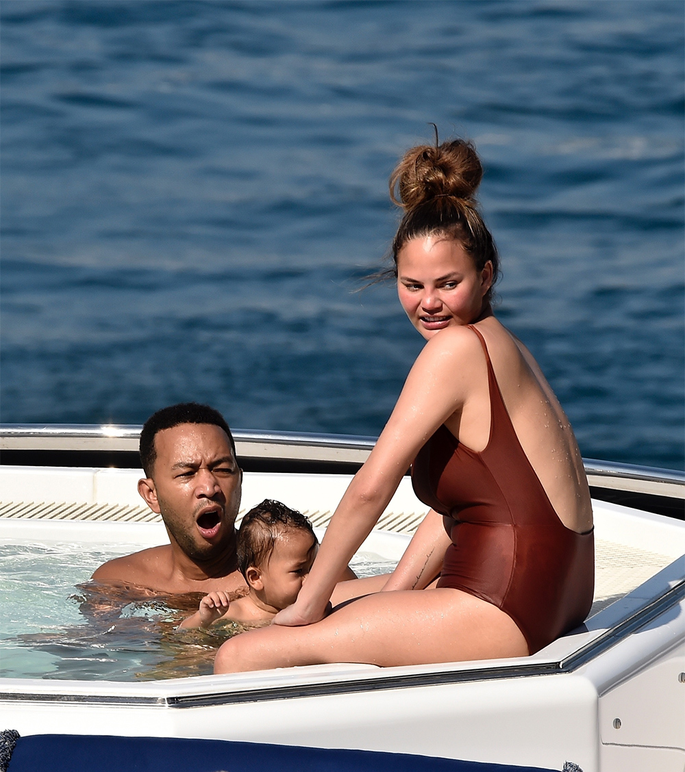 John Legend and Chrissy Teigen enjoy a family boat ride while vacationing in Portofino