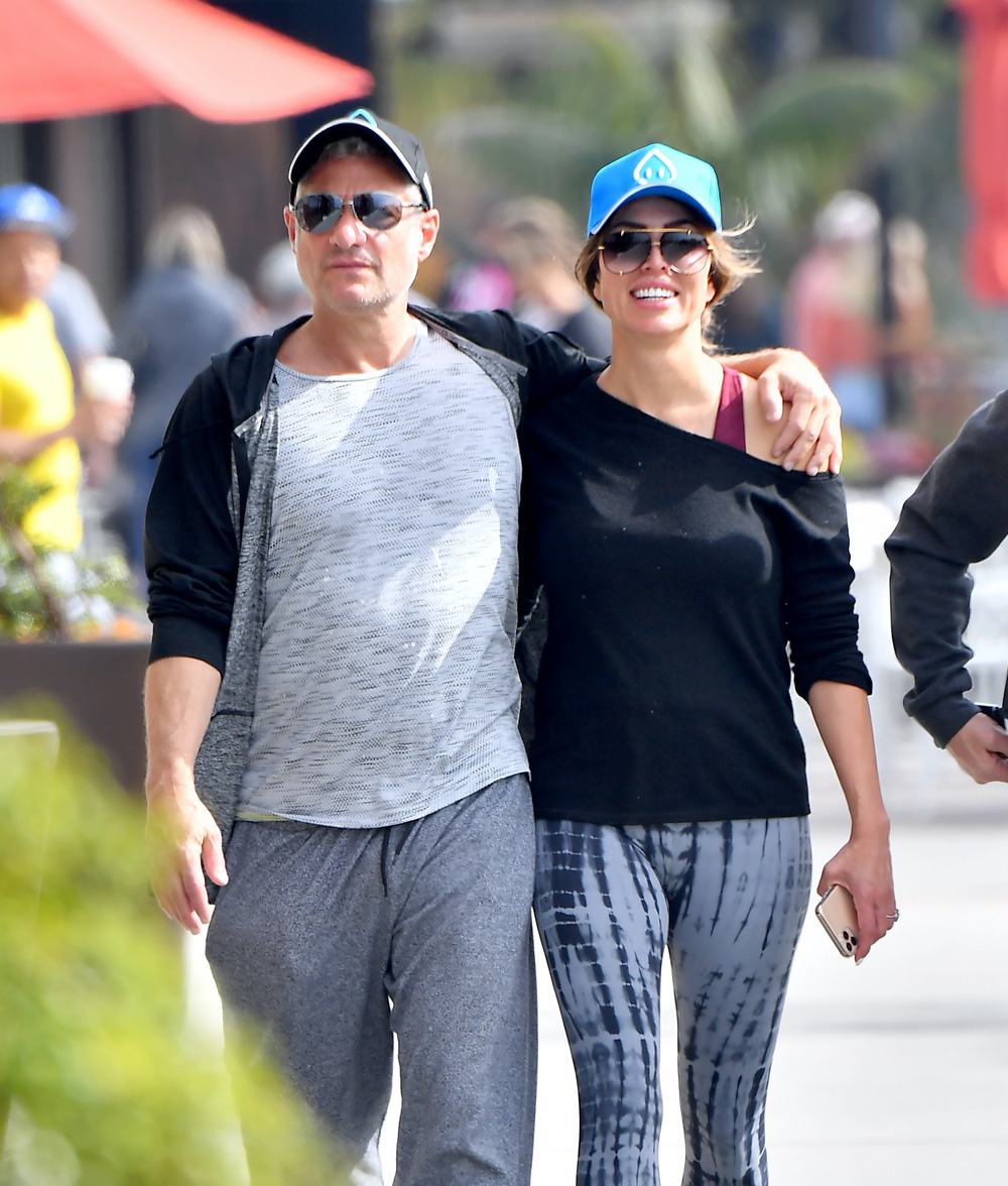 EXCLUSIVE: Kelly Dodd and her fiancé Rick Leventhal pack on the PDA as they head out for lunch in Laguna Beach. The happy couple were seen walking with their arms around each other as they left a restaurant in Laguna Beach. The happy couple were seen looking extremely happy even high fiving each other as they headed to their car. 11 Feb 2020 Pictured: Kelly Dodd and Rick Leventhal. Photo credit: Snorlax / MEGA TheMegaAgency.com +1 888 505 6342 (Mega Agency TagID: MEGA608203_007.jpg) [Photo via Mega Agency]