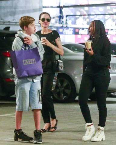 Los Angeles, CA  - *EXCLUSIVE* Angelina Jolie goes shopping with her kids Zahara and Shiloh at Fred Segal in Los Angeles. Angelina checks the price of a fur coat as her kids keep close enjoying their afternoon together.

Pictured: Angelina Jolie, Shiloh Nouvel Jolie-Pitt, Zahara Marley Jolie-Pitt

BACKGRID USA 8 AUGUST 2019 

USA: +1 310 798 9111 / usasales@backgrid.com

UK: +44 208 344 2007 / uksales@backgrid.com

*UK Clients - Pictures Containing Children
Please Pixelate Face Prior To Publication*