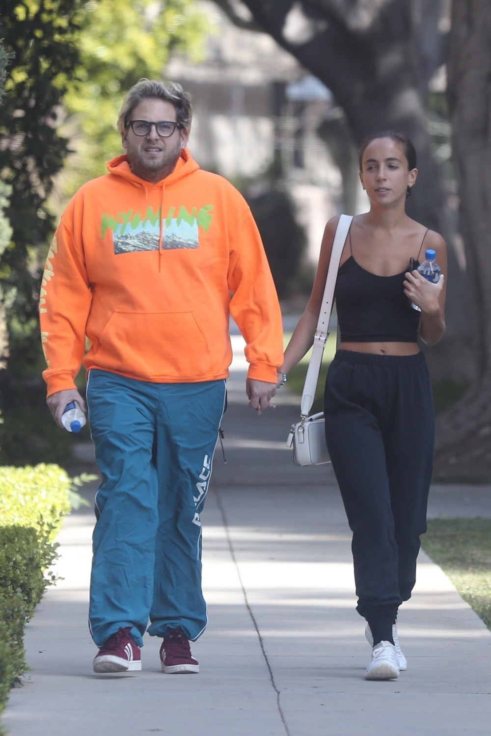 *EXCLUSIVE* Jonah Hill and his girlfriend Gianna Santos enjoy a romantic walk together