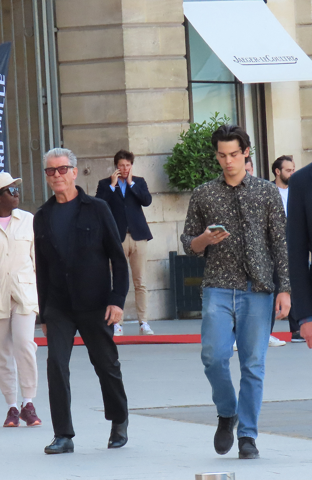 EXCLUSIVE: Actor Pierce Brosnan is seen with his lookalike son Paris as they step out together in Paris, France