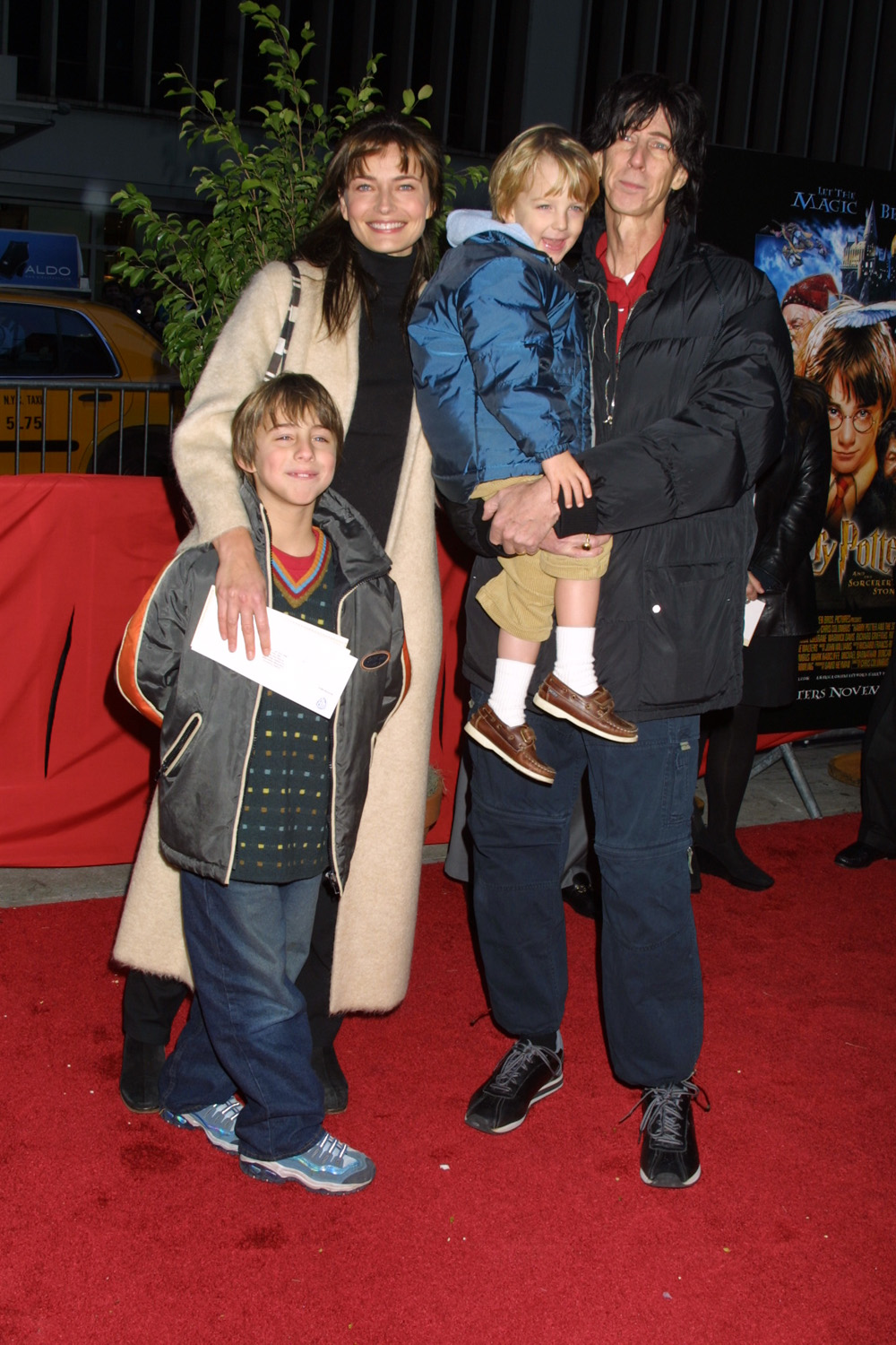 Paulina Porizkova with her son and husband Ric Ocasek with his daughter arriving to the premiere of Harry Potter and the Sorcerers Stone at the Ziegfeld Theatre in New York |City on November 11 2001.||Manhattan New York||PhotoÂ Matt Baron/BEI