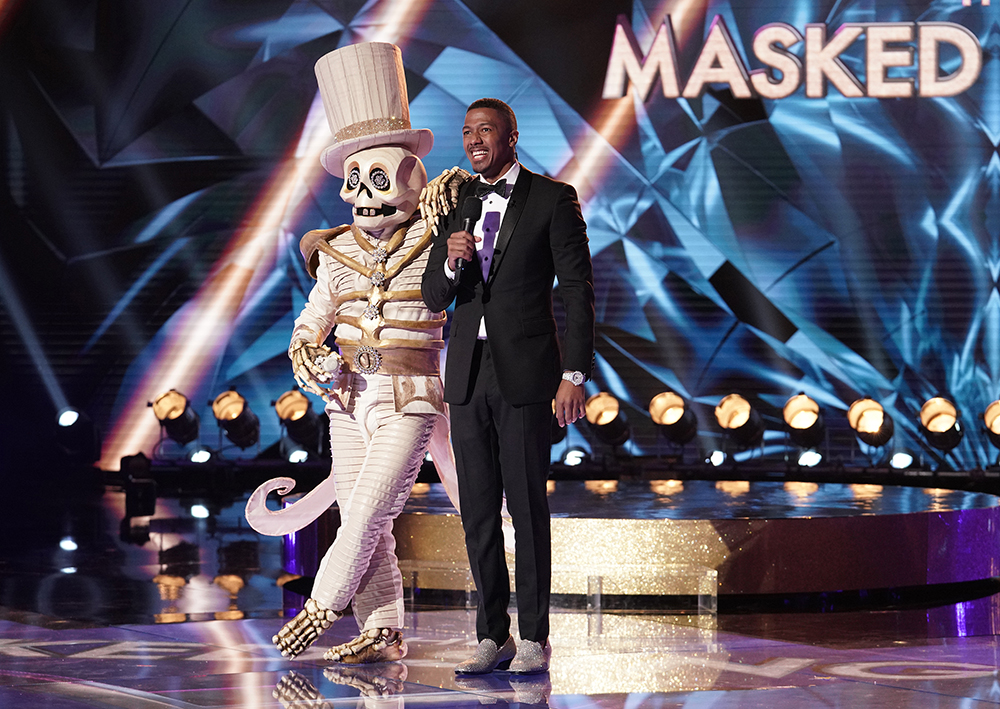 THE MASKED SINGER: L-R: The Skeleton and host Nick Cannon. THE MASKED SINGER premieres Wednesday, Sept. 25 (8:00-10:00 PM ET/PT) on FOX. © 2019 FOX MEDIA LLC. Cr: The Michael Becker/FOX.