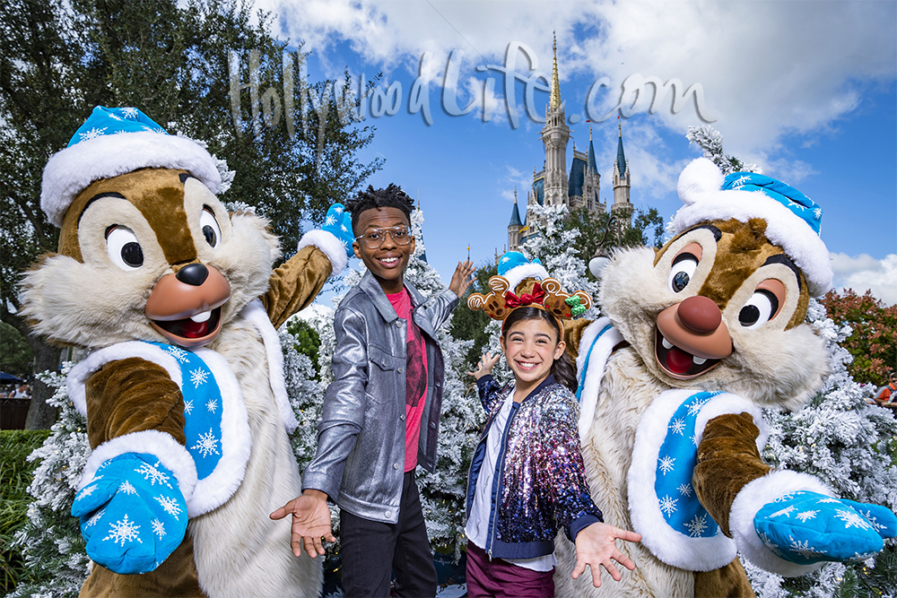 Disney Channel’s “BUNK'D” stars Scarlett Estevez and Israel Johnson pose with Chip ‘n Dale at Magic Kingdom Park in Lake Buena Vista, Fla., while taping the “Disney Channel Holiday Party @ Walt Disney World,” airing Friday, Dec. 13, from 8:00-8:30 p.m. EST/PST, on Disney Channel and in the DisneyNOW app. (Matt Stroshane/Walt Disney World Resort)