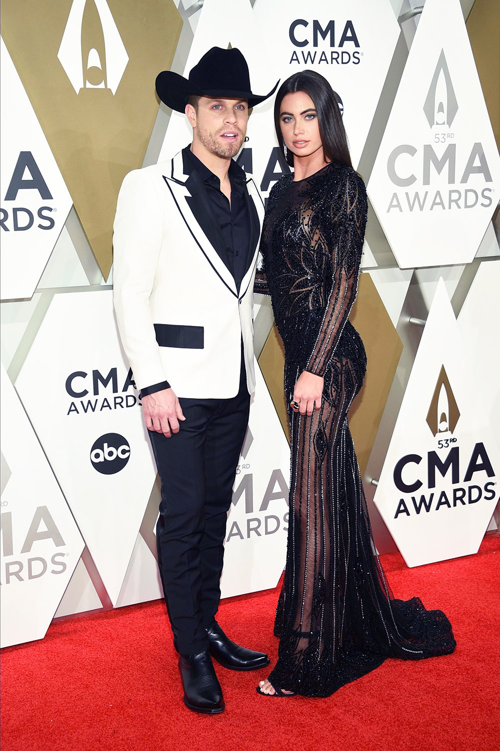 Dustin Lynch, Kelli Seymour. Dustin Lynch, left, and Kelli Seymour arrive at the 53rd annual CMA Awards at Bridgestone Arena, in Nashville, Tenn
53rd Annual CMA Awards - Arrivals, Nashville, USA - 13 Nov 2019